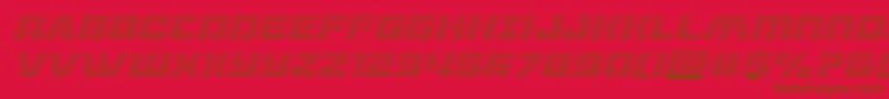 フォントdronetrackergradital – 赤い背景に茶色の文字