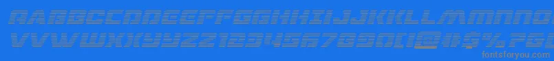 フォントdronetrackergradital – 青い背景に灰色の文字