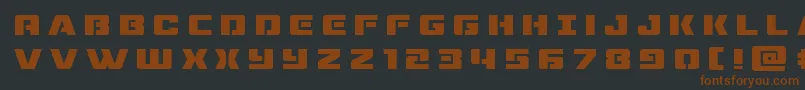 dronetrackertitle-fontti – ruskeat fontit mustalla taustalla