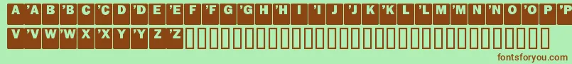 フォントDropCaps Sans – 緑の背景に茶色のフォント