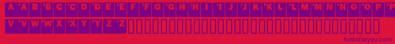 DropCaps Sans Font – Purple Fonts on Red Background