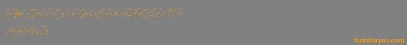 Drunkgun  Personal Use -Schriftart – Orangefarbene Schriften auf grauem Hintergrund