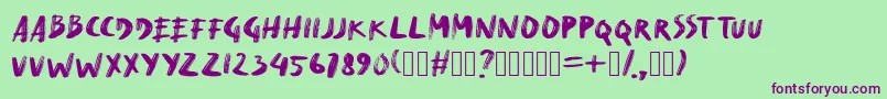 DryMakerXXS Font – Purple Fonts on Green Background