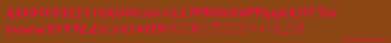 DryMakerXXS Font – Red Fonts on Brown Background