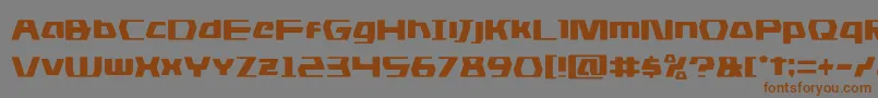 フォントdsman – 茶色の文字が灰色の背景にあります。