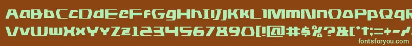 フォントdsman – 緑色の文字が茶色の背景にあります。