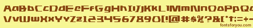 フォントdsman – 茶色の文字が黄色の背景にあります。