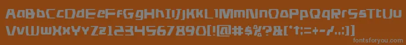 フォントdsmancond – 茶色の背景に灰色の文字