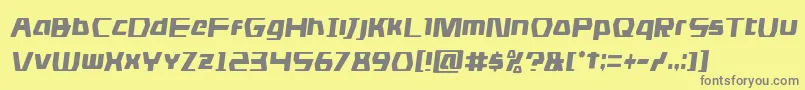 フォントdsmancondsemital – 黄色の背景に灰色の文字