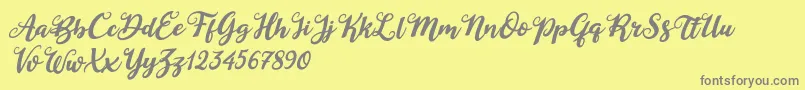 Duck in Shipah Italic-Schriftart – Graue Schriften auf gelbem Hintergrund