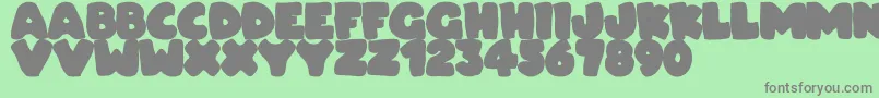Dudeludel Font – Gray Fonts on Green Background