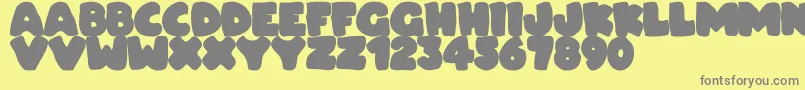 More about Dudeludel Font Dudeludel Font – Gray Fonts on Yellow Background