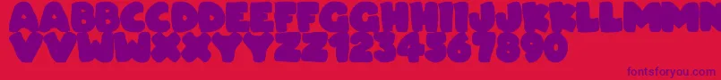Dudeludel Font – Purple Fonts on Red Background