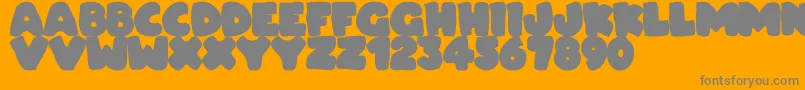 Dudeludel Font – Gray Fonts on Orange Background