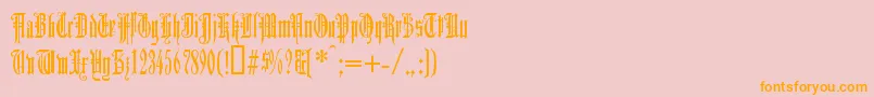 フォントDUERG    – オレンジの文字がピンクの背景にあります。