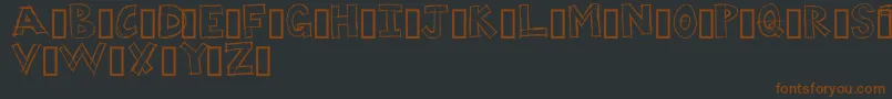 DUMPS Font – Brown Fonts on Black Background