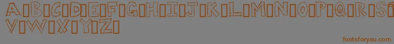 DUMPS Font – Brown Fonts on Gray Background