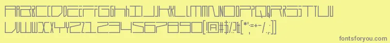 Durmstrong-fontti – harmaat kirjasimet keltaisella taustalla