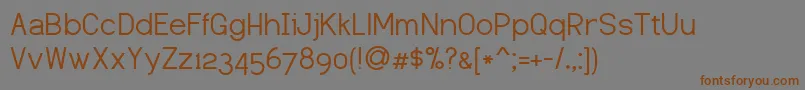 Шрифт Dustismo – коричневые шрифты на сером фоне