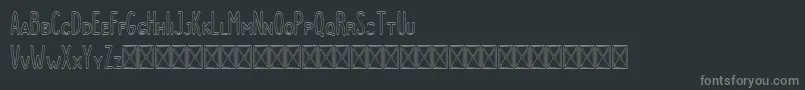 Dutchy Outline-fontti – harmaat kirjasimet mustalla taustalla