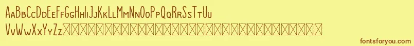フォントDutchy Rough – 茶色の文字が黄色の背景にあります。