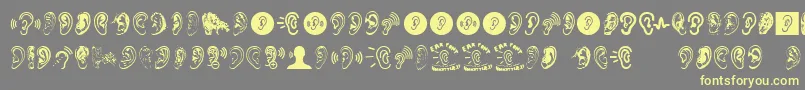 Ear Font – Yellow Fonts on Gray Background