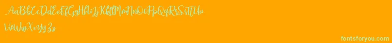 Earcy Day Font – Green Fonts on Orange Background