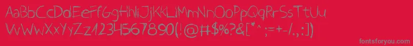 OnTheWagon-Schriftart – Graue Schriften auf rotem Hintergrund
