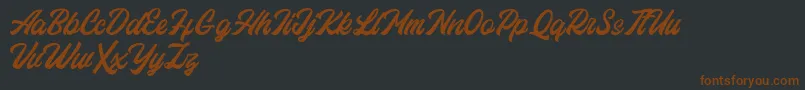 Eastchaft FREE Font – Brown Fonts on Black Background