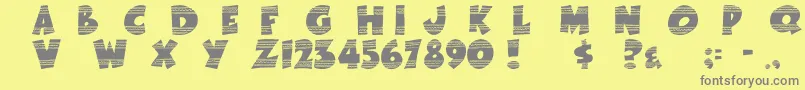 EasterFunbyTom-fontti – harmaat kirjasimet keltaisella taustalla