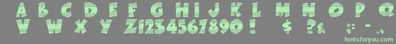 フォントEasterFunbyTom – 灰色の背景に緑のフォント