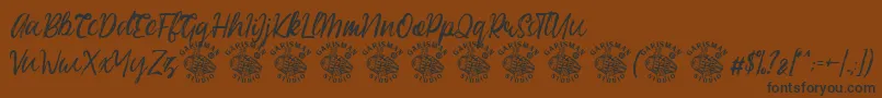 Easttalia Demo Font – Black Fonts on Brown Background