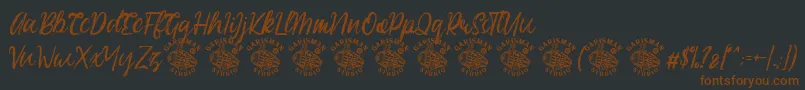 Easttalia Demo-fontti – ruskeat fontit mustalla taustalla