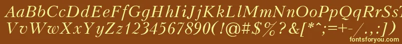 PeterburgItalic-fontti – keltaiset fontit ruskealla taustalla