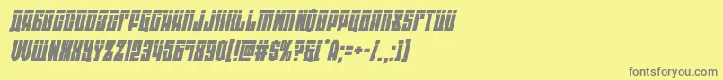 フォントeastwestlaserital – 黄色の背景に灰色の文字