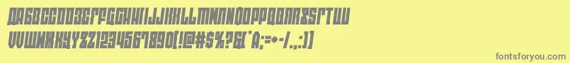 フォントeastwestsemital – 黄色の背景に灰色の文字