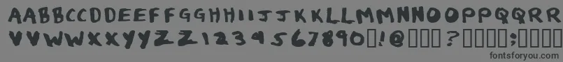 Eau de Toilet-Schriftart – Schwarze Schriften auf grauem Hintergrund