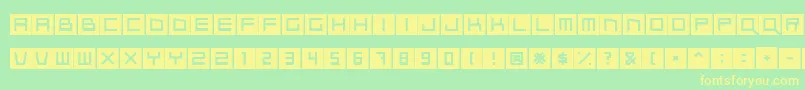 フォントQubix – 黄色の文字が緑の背景にあります