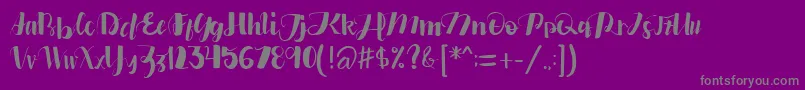 フォントedfander – 紫の背景に灰色の文字