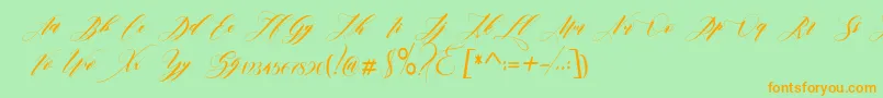 フォントedore – オレンジの文字が緑の背景にあります。