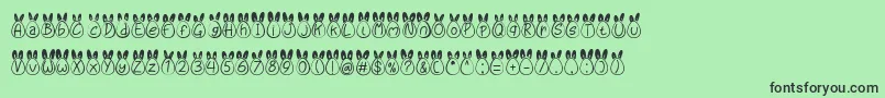 Шрифт Eggy Bunny Ear – чёрные шрифты на зелёном фоне