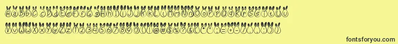 Eggy Bunny Ear-Schriftart – Schwarze Schriften auf gelbem Hintergrund