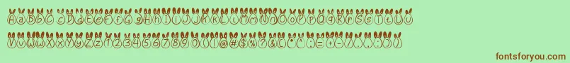 フォントEggy Bunny Ear – 緑の背景に茶色のフォント