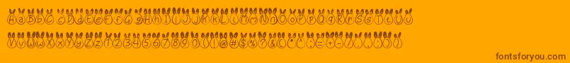 Eggy Bunny Ear-Schriftart – Braune Schriften auf orangefarbenem Hintergrund