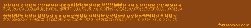 Eggy Bunny Ear-Schriftart – Orangefarbene Schriften auf braunem Hintergrund