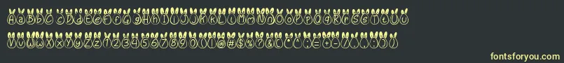 Eggy Bunny Ear Font – Yellow Fonts on Black Background