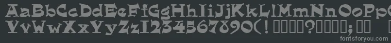 eglantine-fontti – harmaat kirjasimet mustalla taustalla