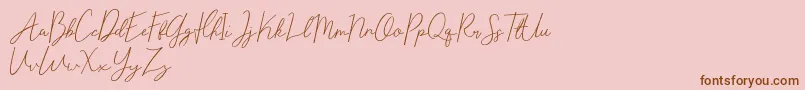 Eisley Claise Free-Schriftart – Braune Schriften auf rosa Hintergrund