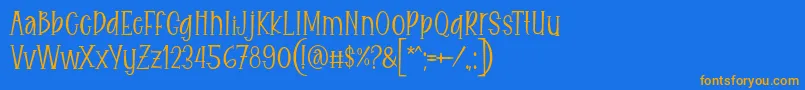 Czcionka Eitaro Font by 7NTypes – pomarańczowe czcionki na niebieskim tle