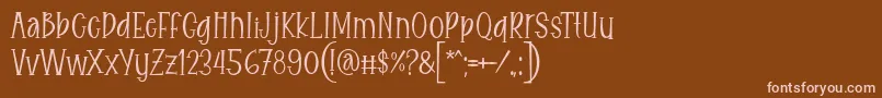 Eitaro Font by 7NTypes-Schriftart – Rosa Schriften auf braunem Hintergrund